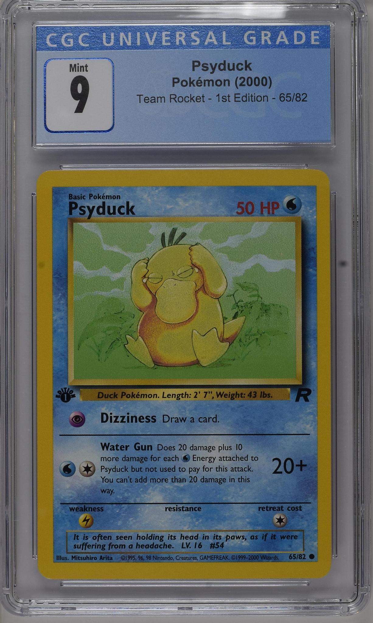 2000 Pokemon #65/82 Psyduck Team Rocket - 1st Edition CGC 9